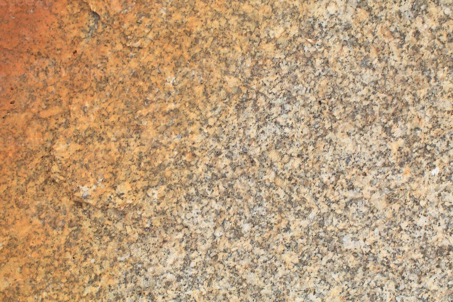 Abstract natural rock stone granite grunge rusty metal texture design background natural color stone material granite design wallpaper. Close-up detail of natural stone photo
