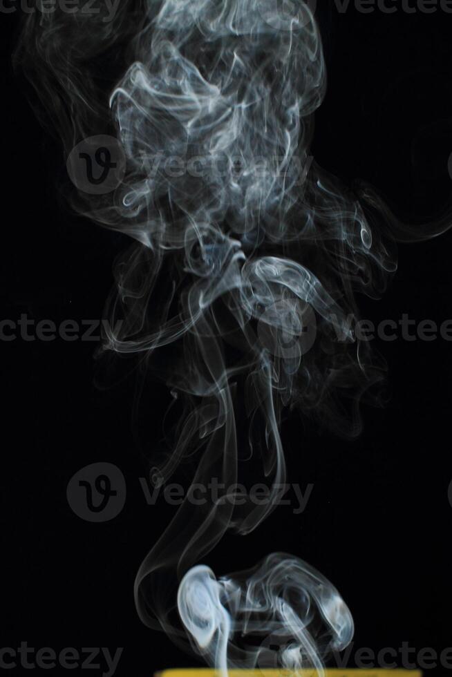 Abstract white smoke texture moves on black background Plume of smoke wave design wallpaper. Design element. Abstract texture photo