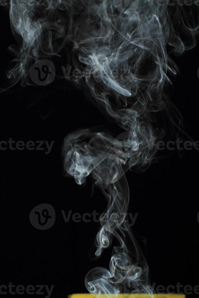 Abstract white smoke texture moves on black background Plume of smoke wave design wallpaper. Design element. Abstract texture photo