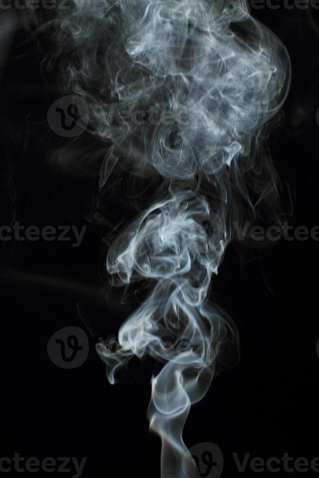 Abstract white smoke texture moves on black background Plume of smoke wave design wallpaper. Design element. Abstract texture photo