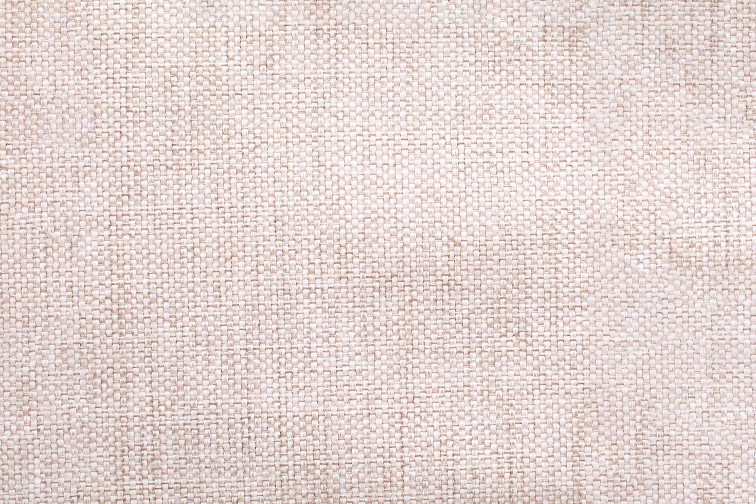 Natural linen material textile canvas Fabric texture background Close-up detail of fabric natural color Hemp material pattern design wallpaper. can be used as background or for graphic design photo