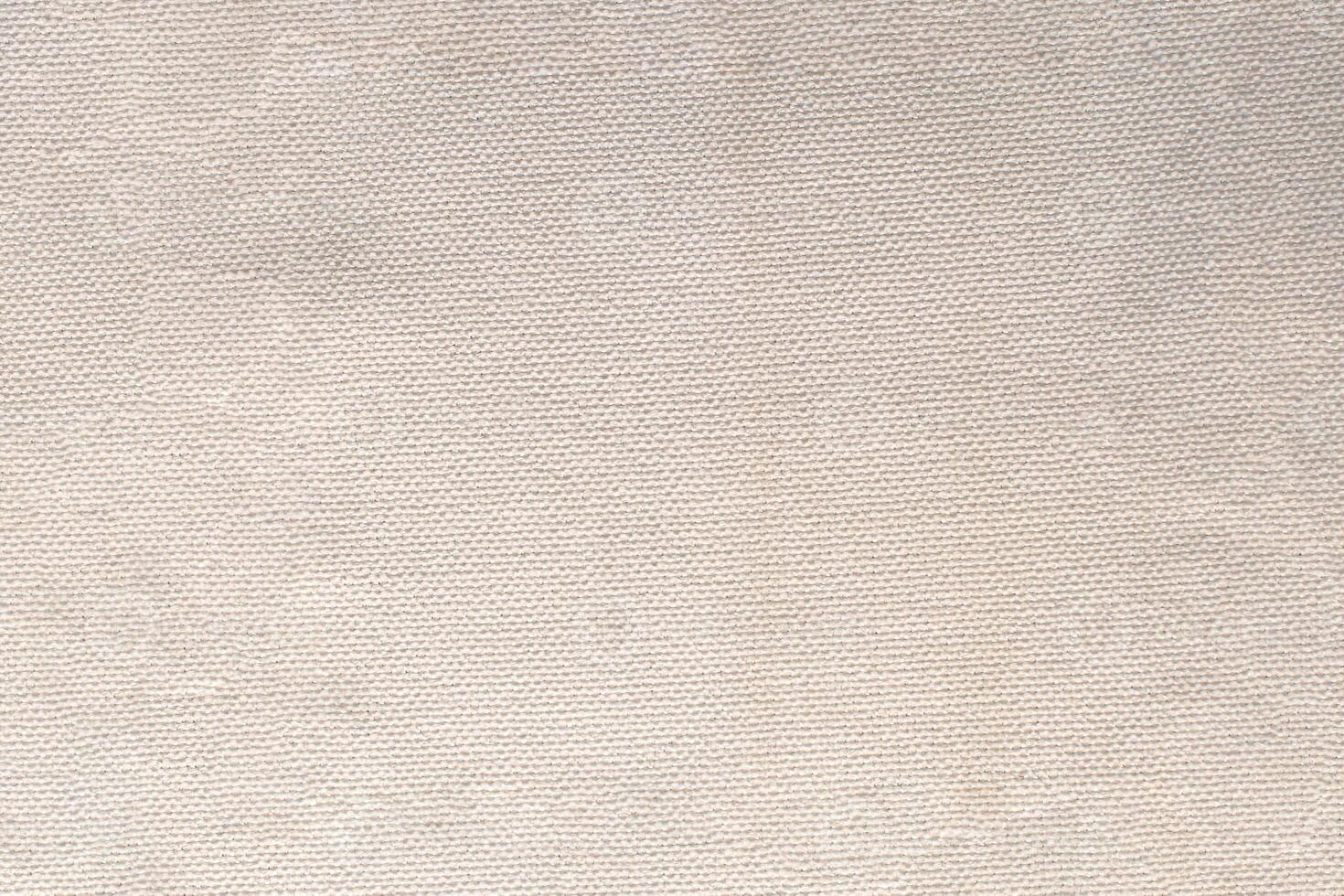 Natural linen material textile canvas Fabric texture background Close-up detail of fabric natural color Hemp material pattern design wallpaper. can be used as background or for graphic design photo