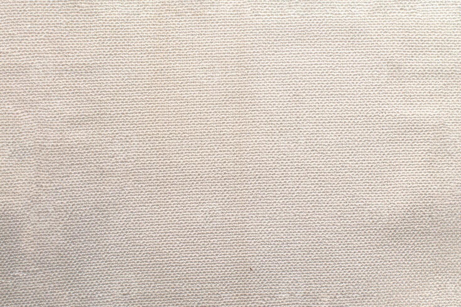 Natural linen material textile canvas Fabric texture background Close-up detail of fabric natural color Hemp material pattern design wallpaper. can be used as background or for graphic design photo