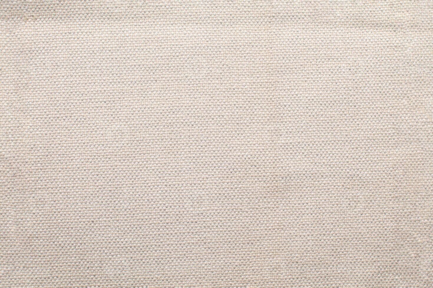 Natural linen material textile canvas Fabric texture background Close-up detail of fabric natural color Hemp material pattern design wallpaper. can be used as background or for graphic design photo