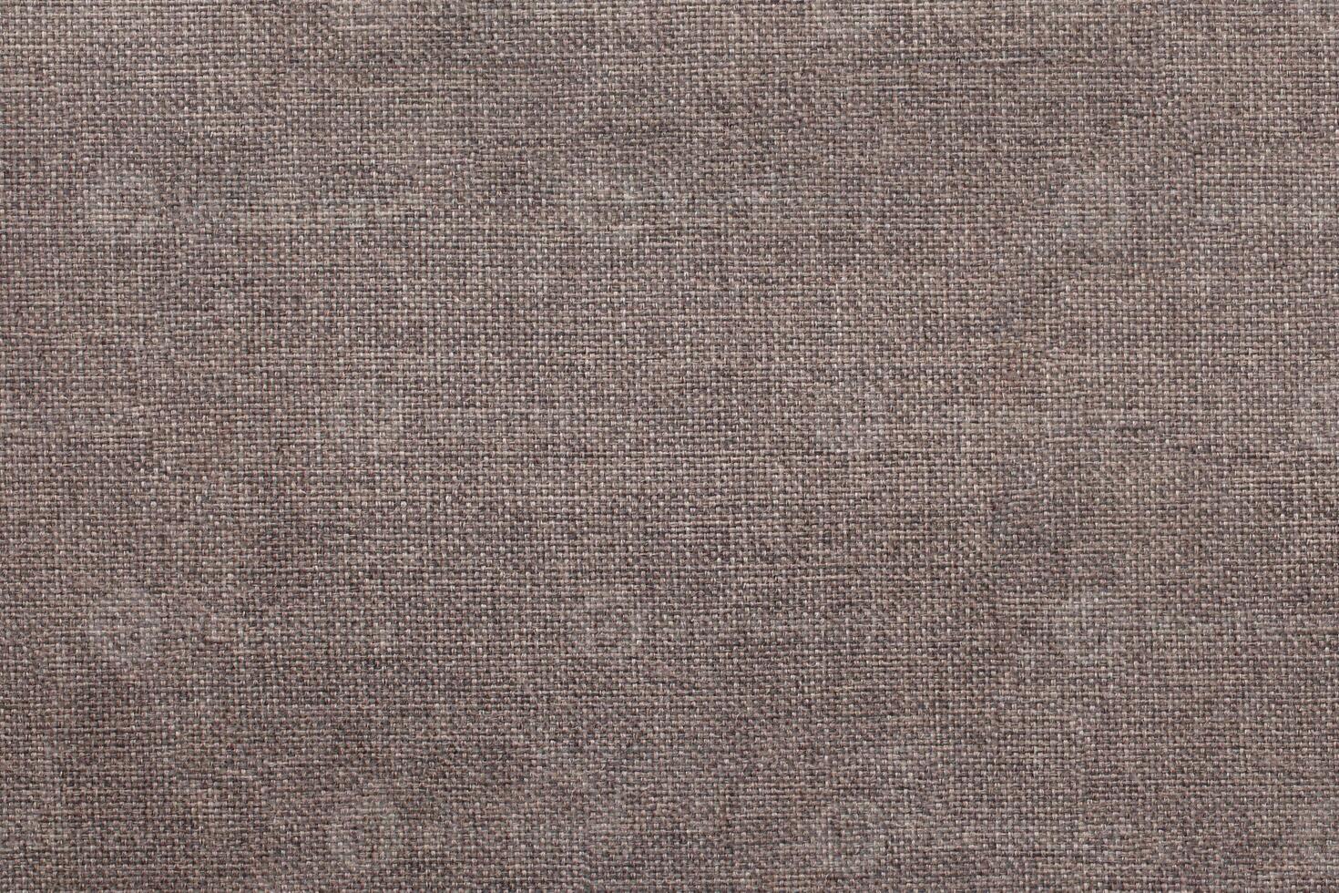 Natural linen material textile canvas Fabric texture background Close-up detail of fabric natural color Hemp material pattern design wallpaper. can be used as background or for graphic design photo