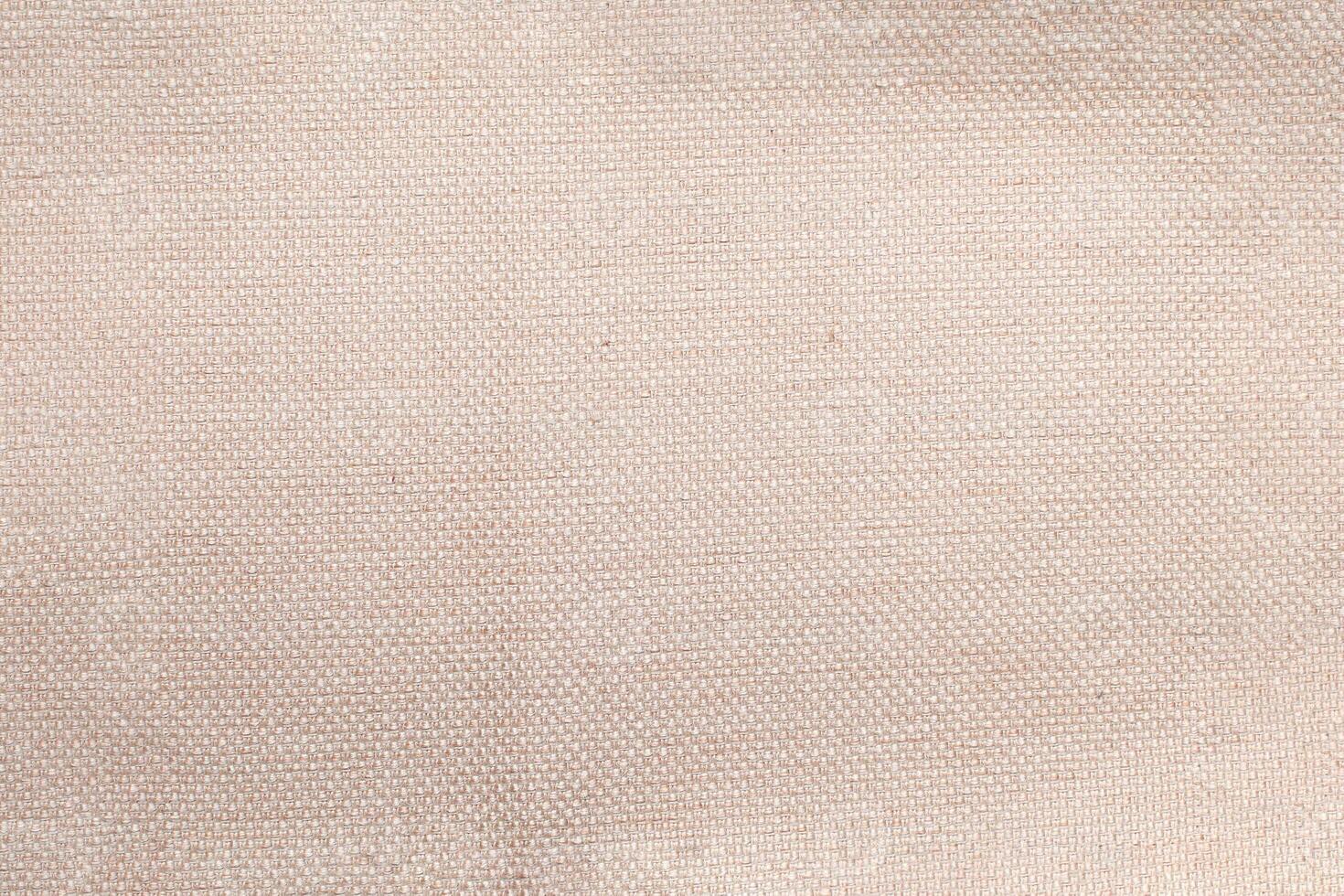 Natural linen material textile canvas Fabric texture background Close-up detail of fabric natural color Hemp material pattern design wallpaper. can be used as background or for graphic design photo