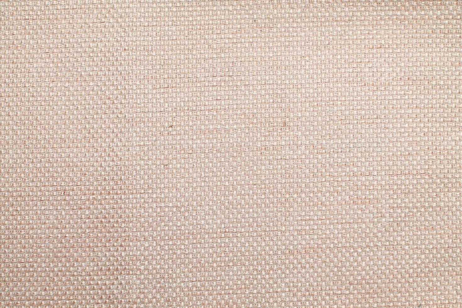 Natural linen material textile canvas Fabric texture background Close-up detail of fabric natural color Hemp material pattern design wallpaper. can be used as background or for graphic design photo