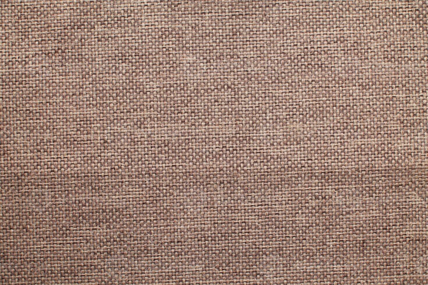 Natural linen material textile canvas Fabric texture background Close-up detail of fabric natural color Hemp material pattern design wallpaper. can be used as background or for graphic design photo