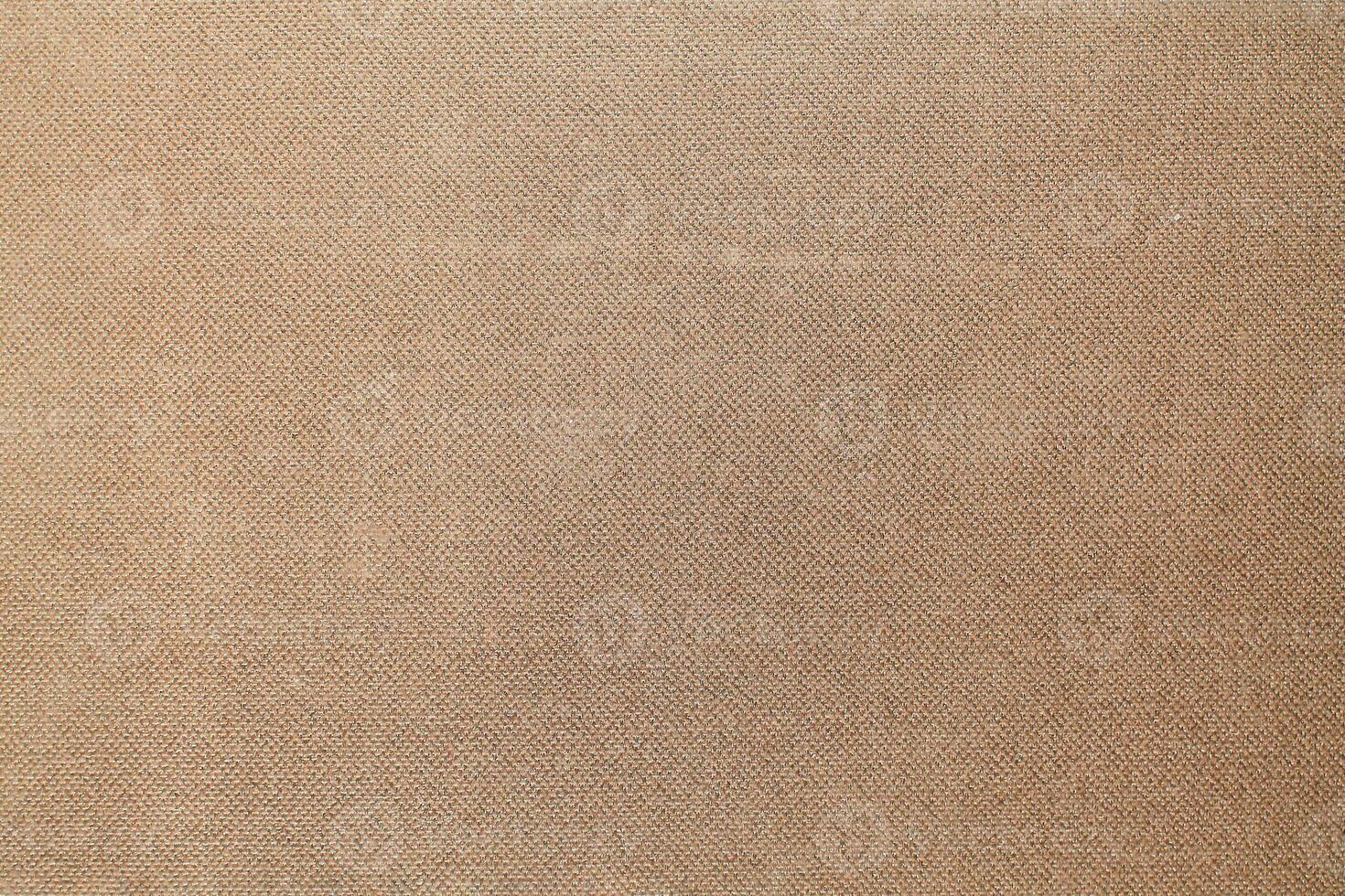 Natural linen material textile canvas Fabric texture background Close-up detail of fabric natural color Hemp material pattern design wallpaper. can be used as background or for graphic design photo