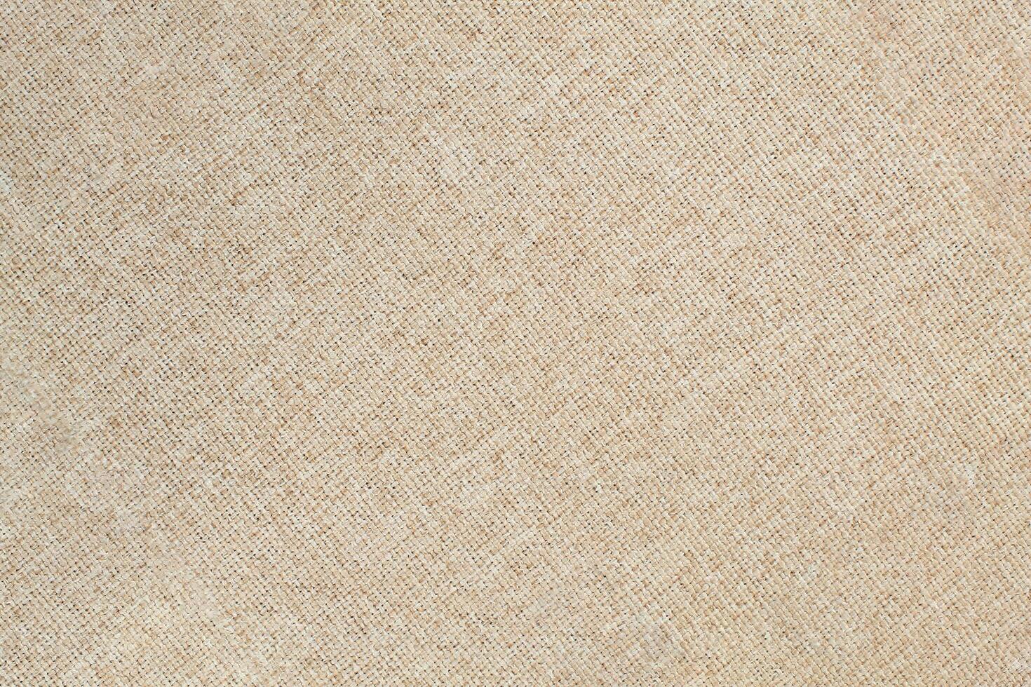 Natural linen material textile canvas Fabric texture background Close-up detail of fabric natural color Hemp material pattern design wallpaper. can be used as background or for graphic design photo