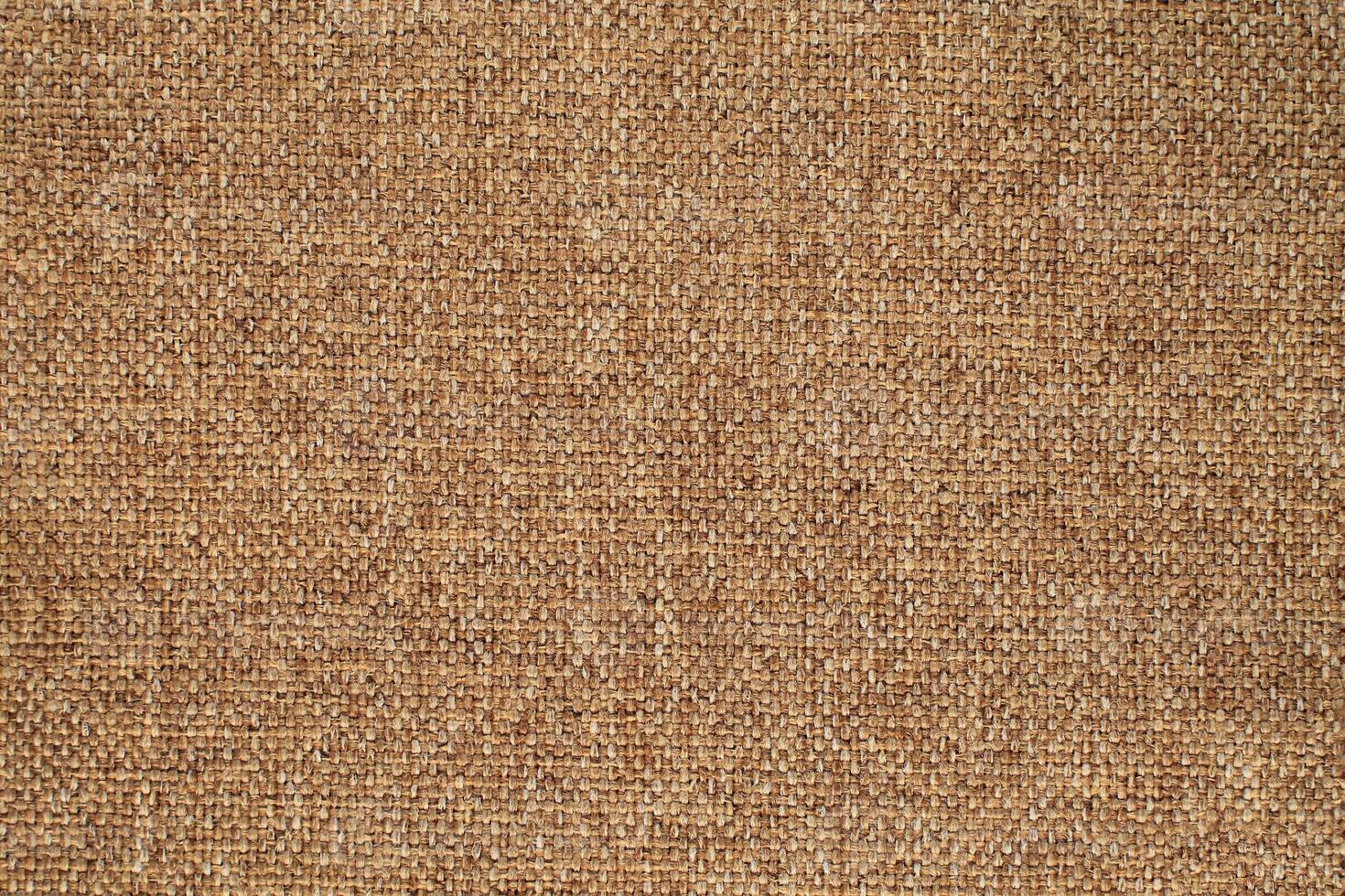 Natural linen material textile canvas Fabric texture background Close-up detail of fabric natural color Hemp material pattern design wallpaper. can be used as background or for graphic design photo