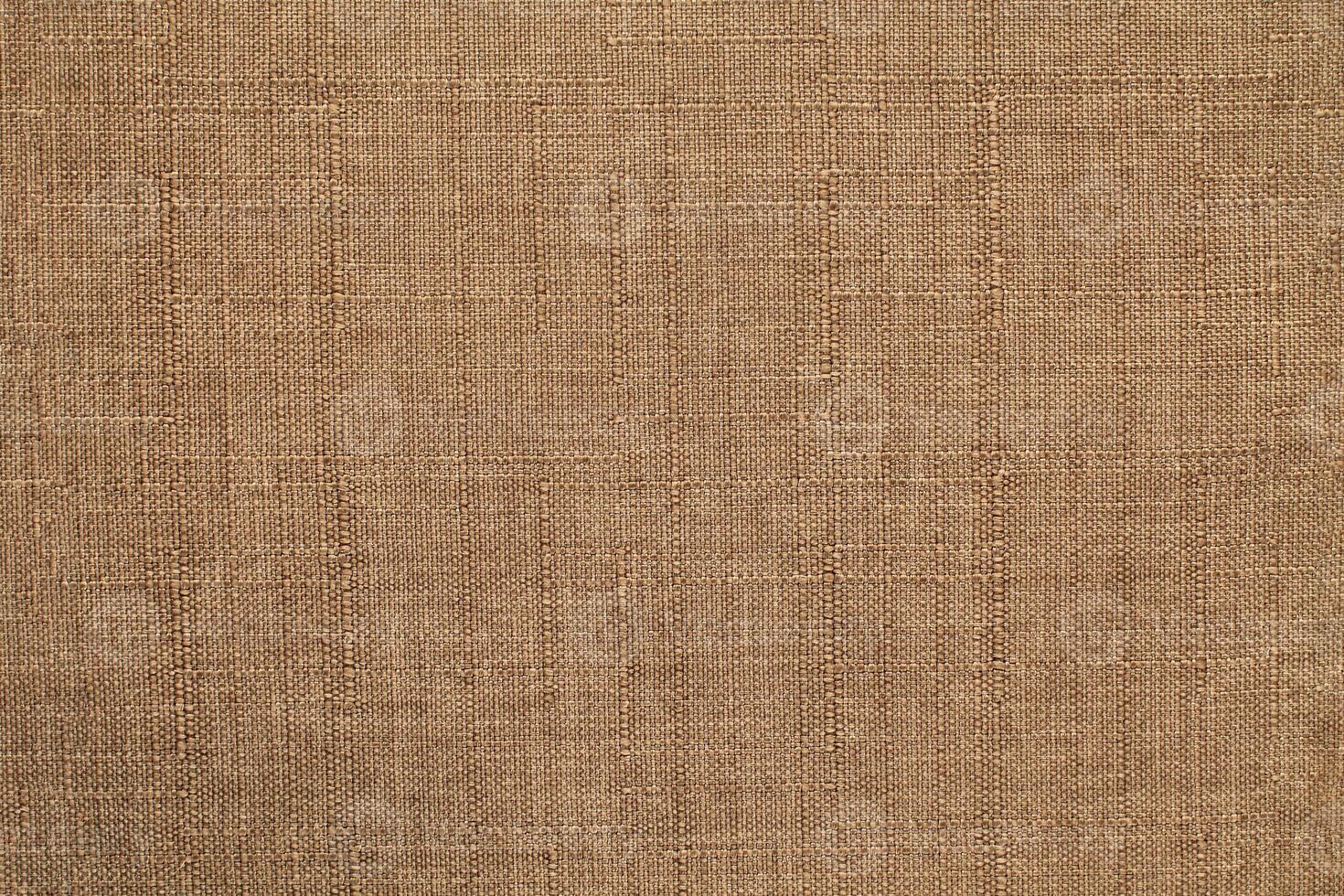 Natural linen material textile canvas Fabric texture background Close-up detail of fabric natural color Hemp material pattern design wallpaper. can be used as background or for graphic design photo