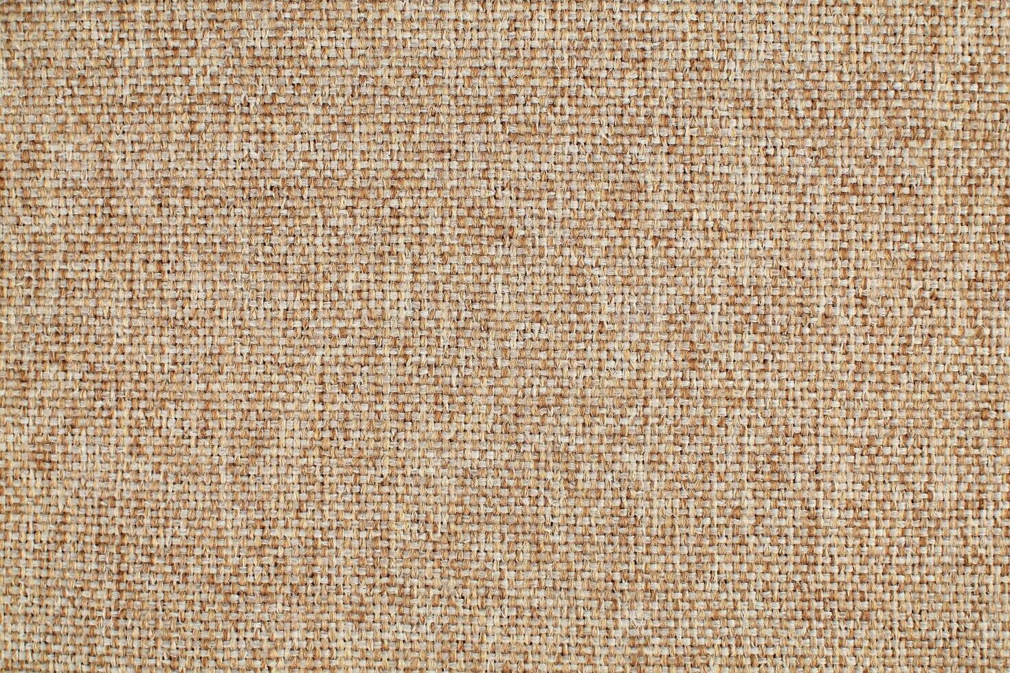 Natural linen material textile canvas Fabric texture background Close-up detail of fabric natural color Hemp material pattern design wallpaper. can be used as background or for graphic design photo
