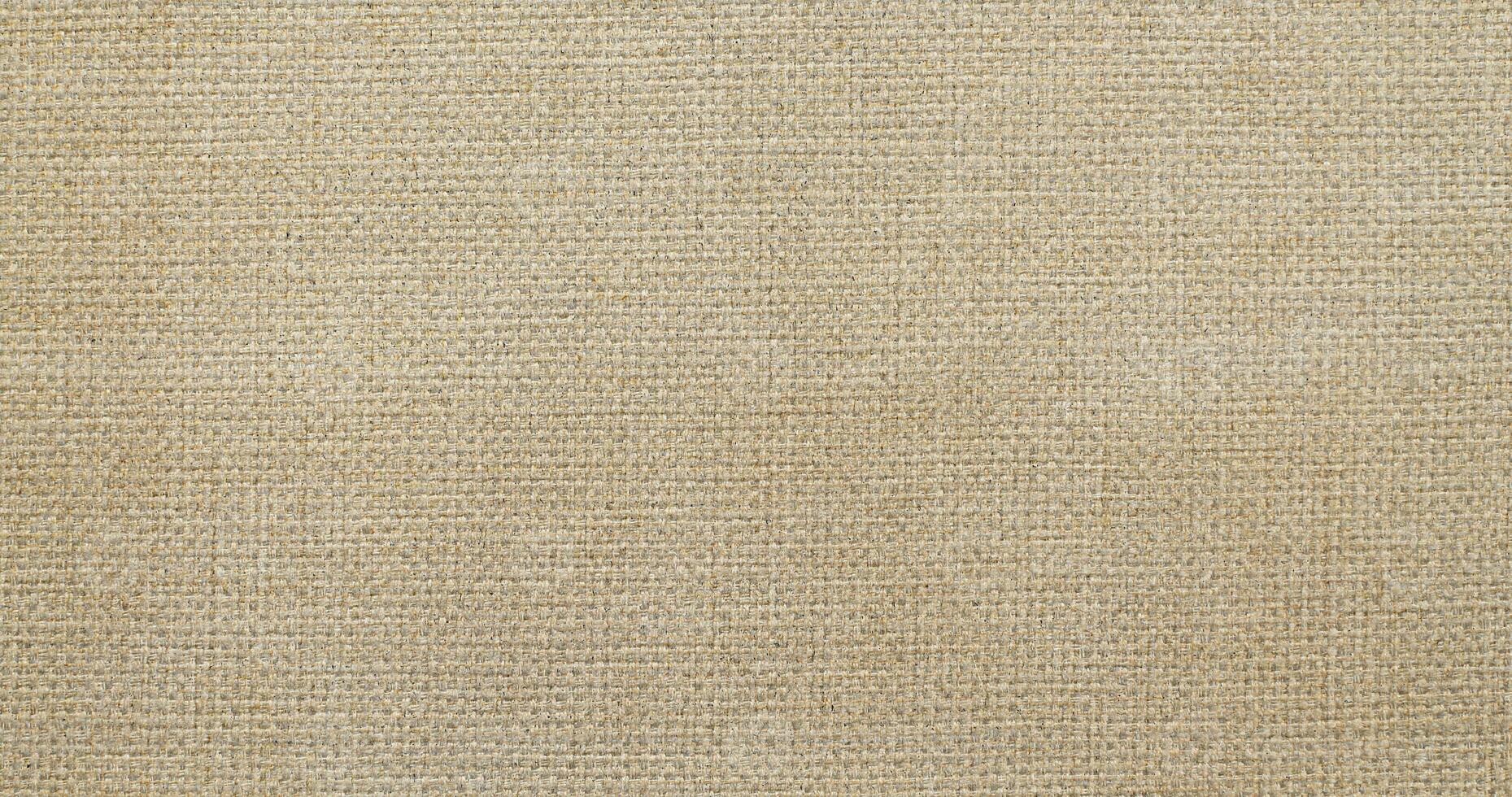 Natural linen material textile canvas Fabric texture background Close-up detail of fabric natural color Hemp material pattern design wallpaper. can be used as background or for graphic design photo
