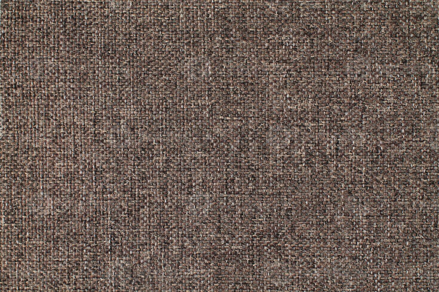 Natural linen material textile canvas Fabric texture background Close-up detail of fabric natural color Hemp material pattern design wallpaper. can be used as background or for graphic design photo