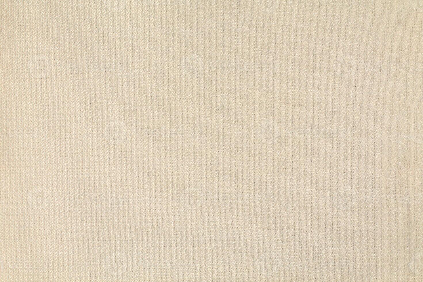 Natural linen material textile canvas Fabric texture background Close-up detail of fabric natural color Hemp material pattern design wallpaper. can be used as background or for graphic design photo