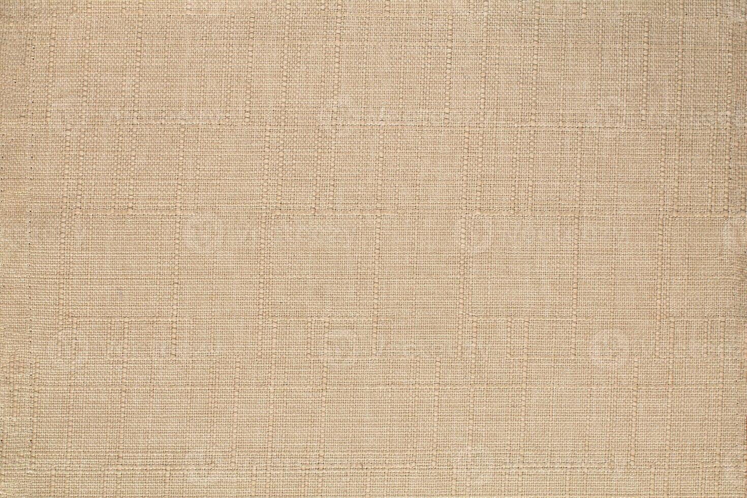 Natural linen material textile canvas Fabric texture background Close-up detail of fabric natural color Hemp material pattern design wallpaper. can be used as background or for graphic design photo