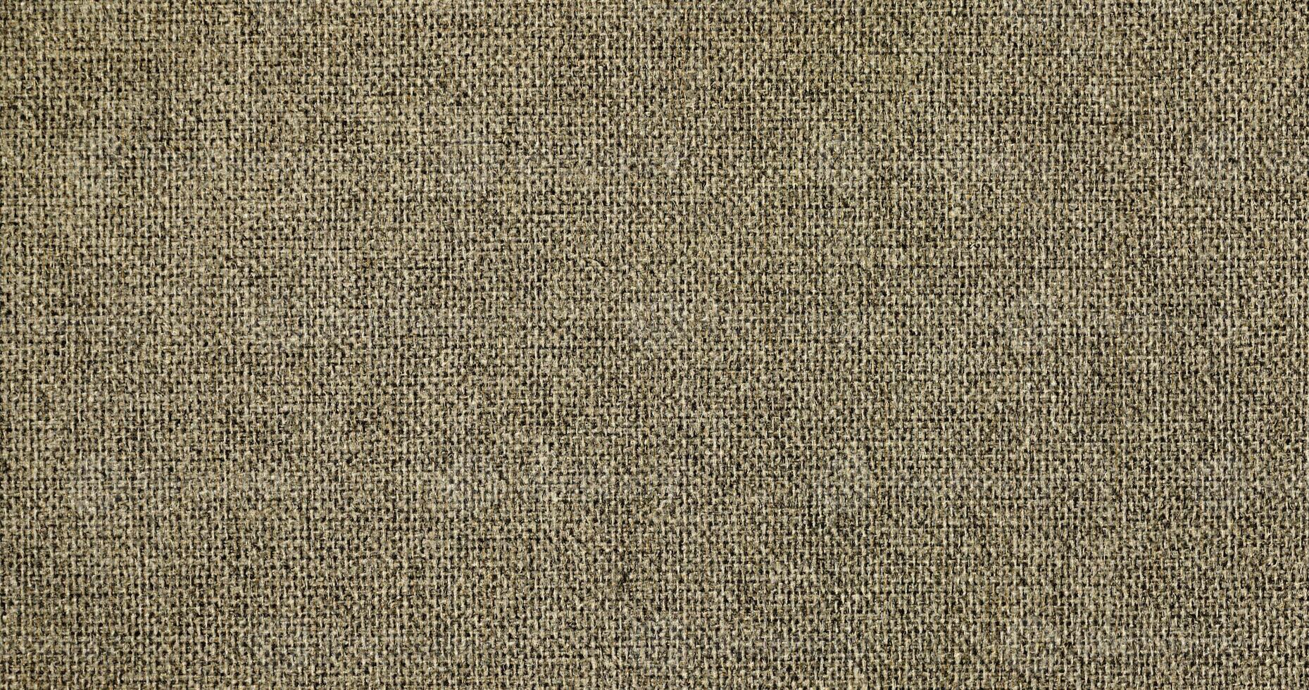 Natural linen material textile canvas Fabric texture background Close-up detail of fabric natural color Hemp material pattern design wallpaper. can be used as background or for graphic design photo
