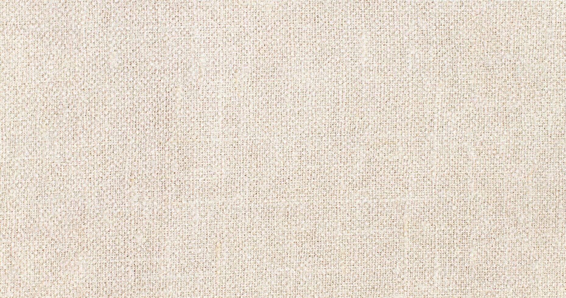 Natural linen material textile canvas Fabric texture background Close-up detail of fabric natural color Hemp material pattern design wallpaper. can be used as background or for graphic design photo