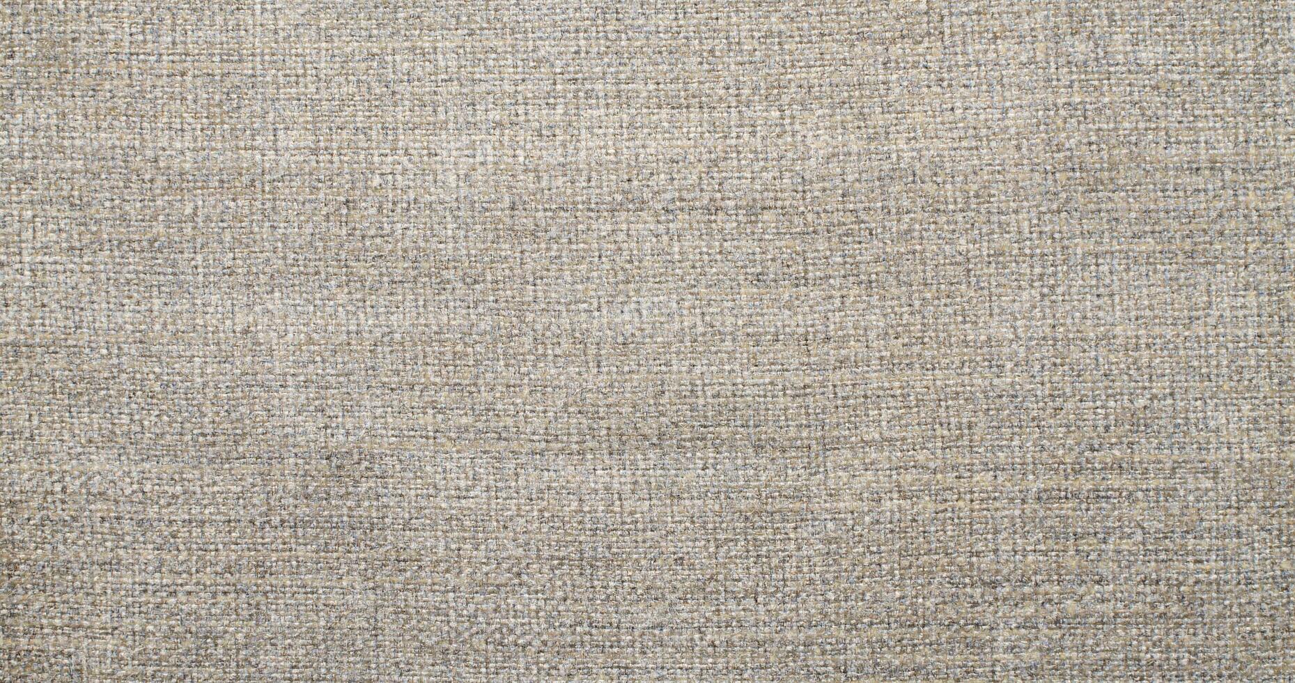 Natural linen material textile canvas Fabric texture background Close-up detail of fabric natural color Hemp material pattern design wallpaper. can be used as background or for graphic design photo