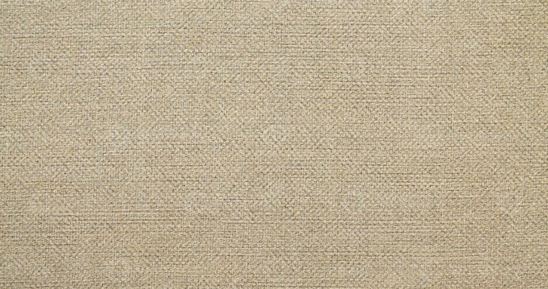 Natural linen material textile canvas Fabric texture background Close-up detail of fabric natural color Hemp material pattern design wallpaper. can be used as background or for graphic design photo