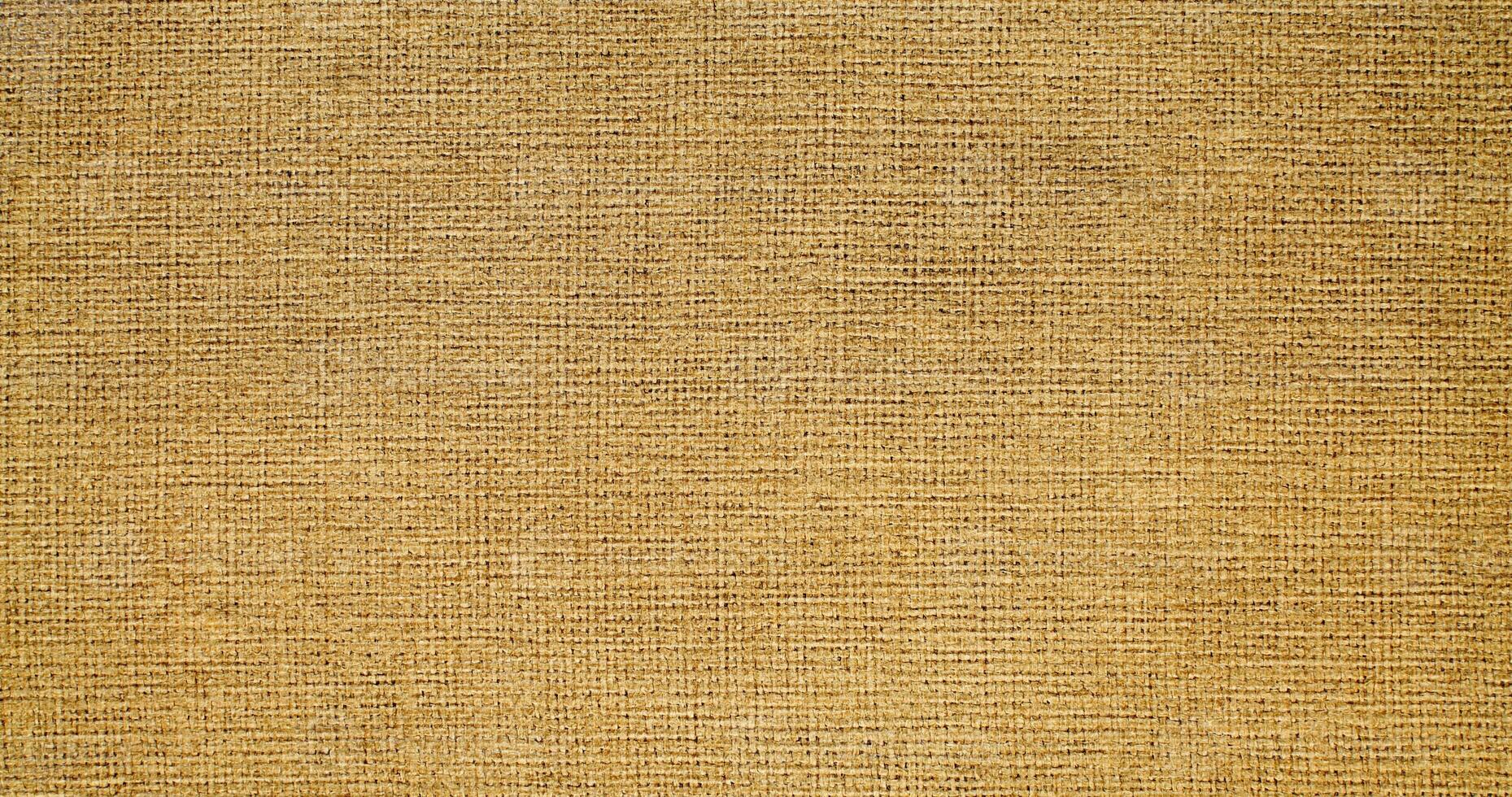 Natural linen material textile canvas Fabric texture background Close-up detail of fabric natural color Hemp material pattern design wallpaper. can be used as background or for graphic design photo