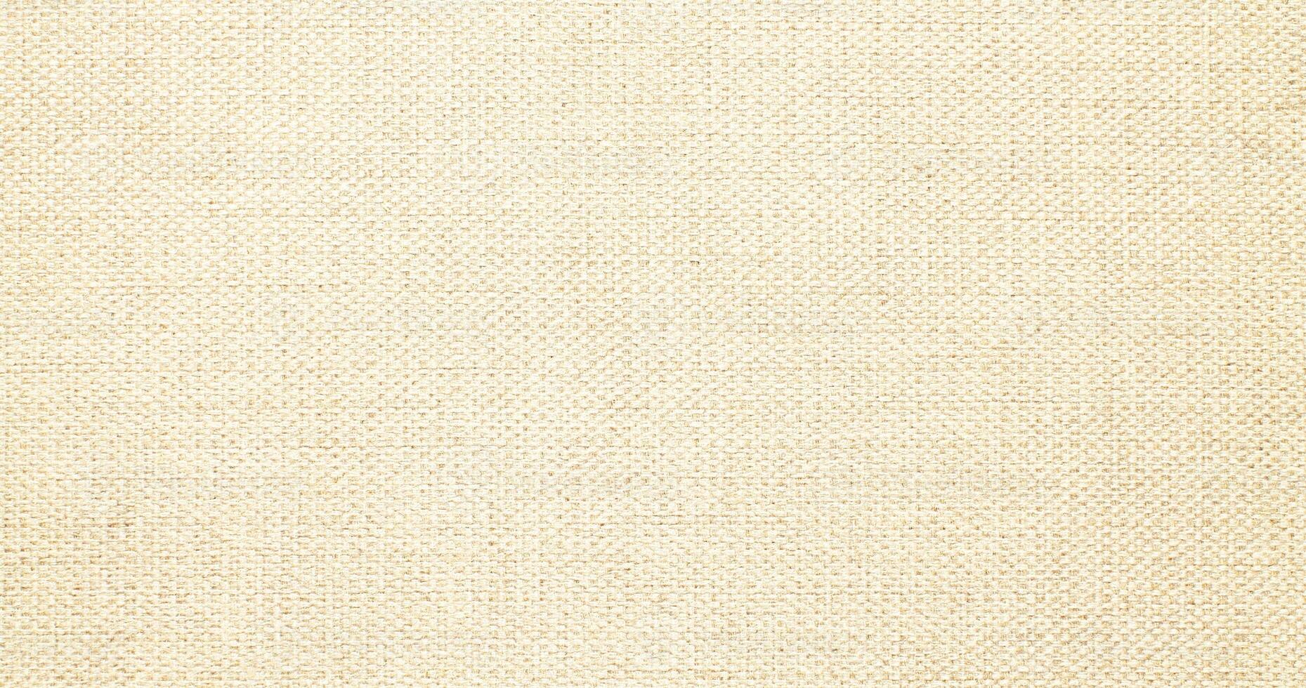 Natural linen material textile canvas Fabric texture background Close-up detail of fabric natural color Hemp material pattern design wallpaper. can be used as background or for graphic design photo