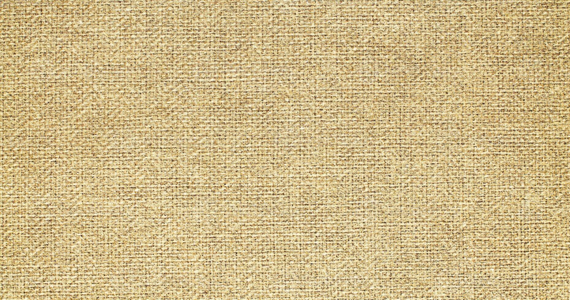 Natural linen material textile canvas Fabric texture background Close-up detail of fabric natural color Hemp material pattern design wallpaper. can be used as background or for graphic design photo