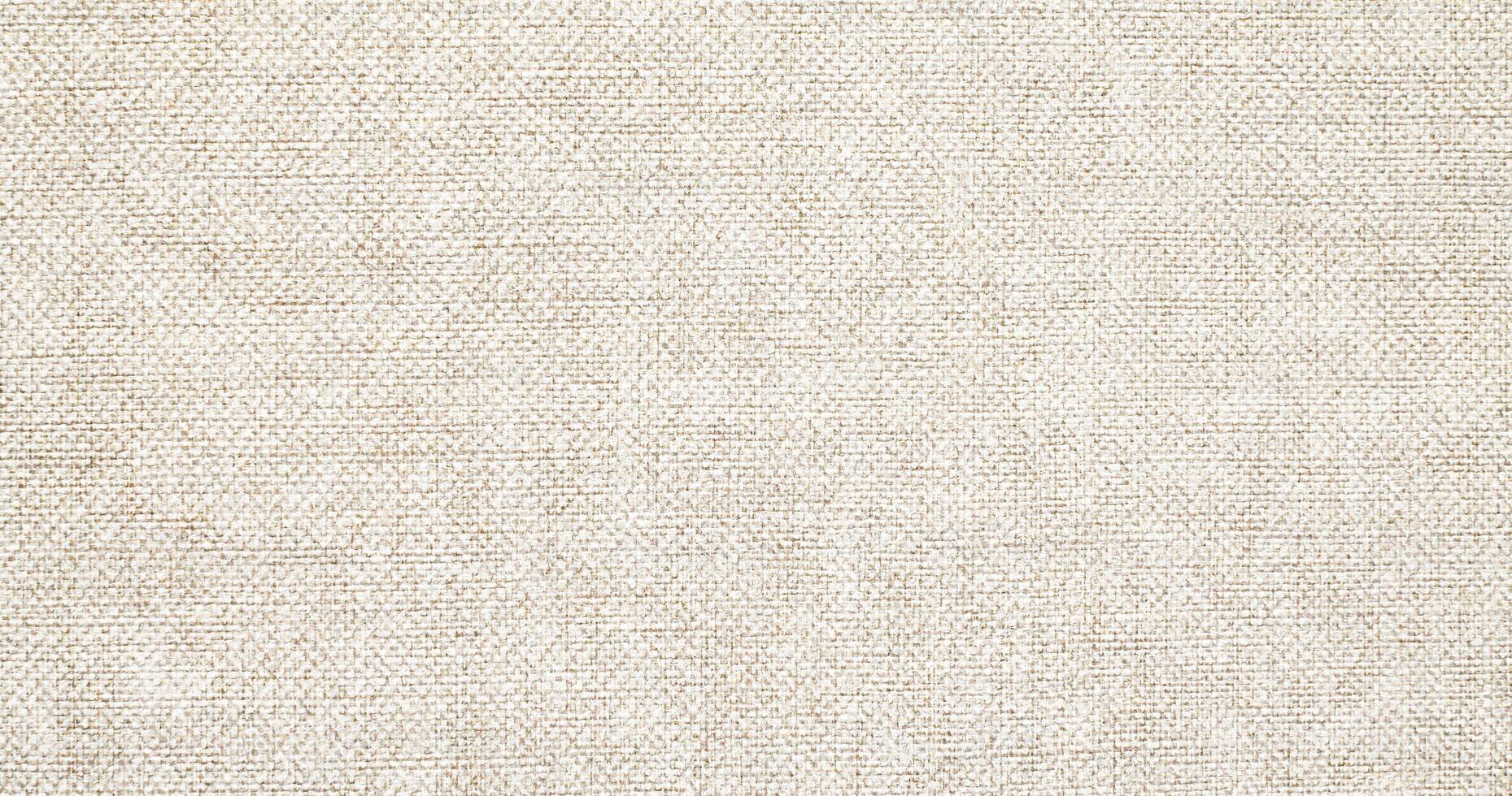 Natural linen material textile canvas Fabric texture background Close-up detail of fabric natural color Hemp material pattern design wallpaper. can be used as background or for graphic design photo