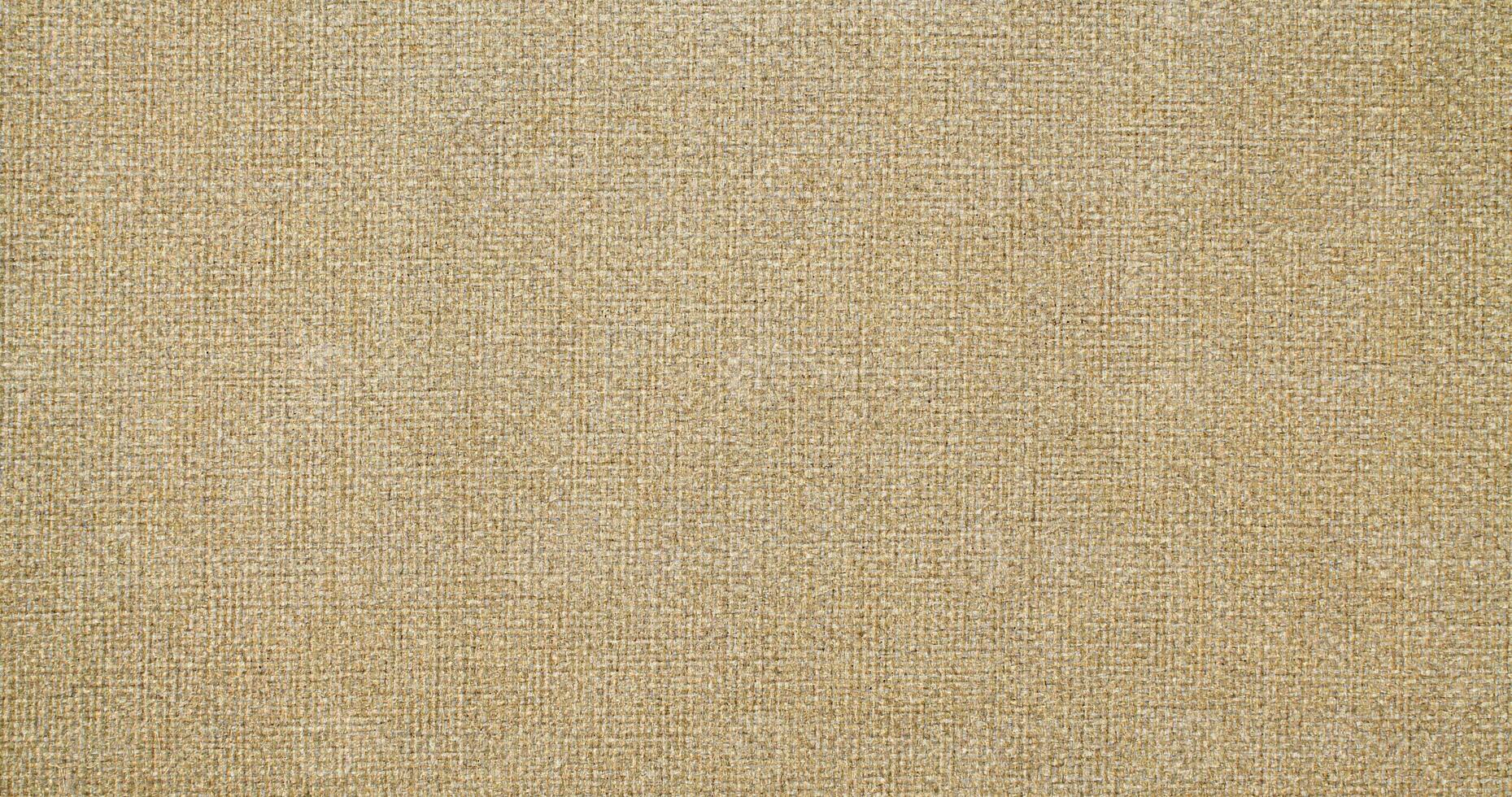 Natural linen material textile canvas Fabric texture background Close-up detail of fabric natural color Hemp material pattern design wallpaper. can be used as background or for graphic design photo