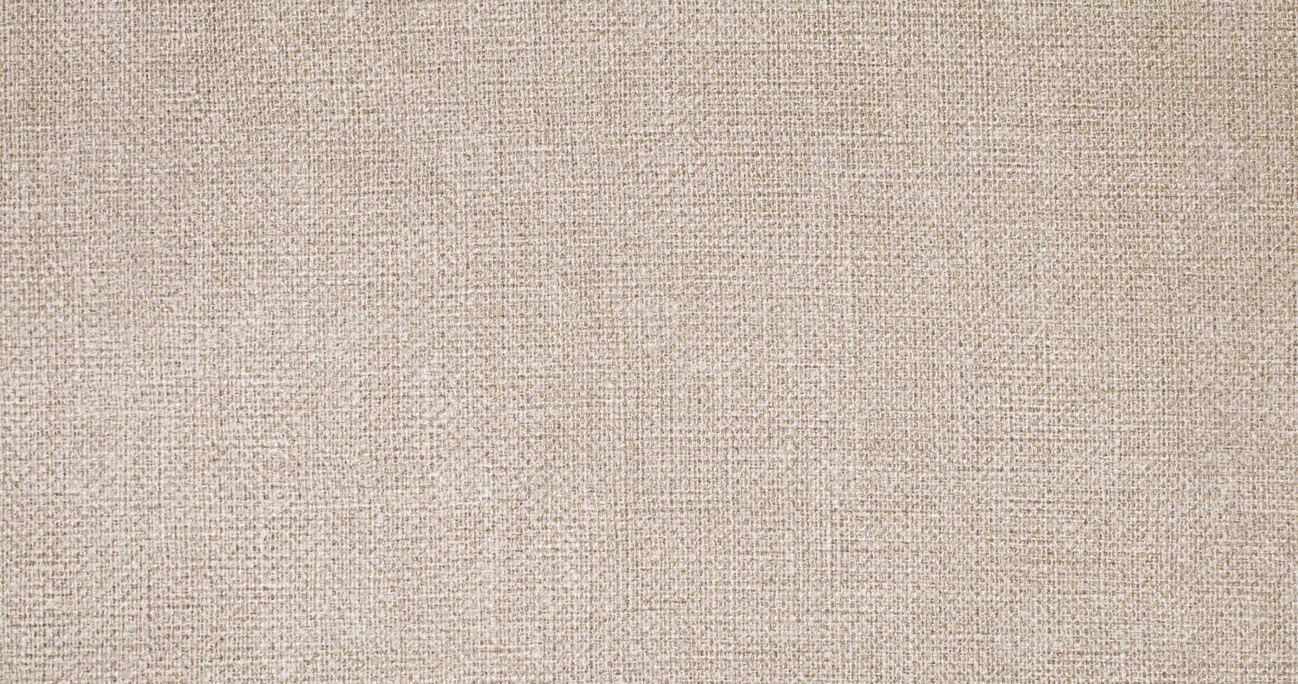 Natural linen material textile canvas Fabric texture background Close-up detail of fabric natural color Hemp material pattern design wallpaper. can be used as background or for graphic design photo