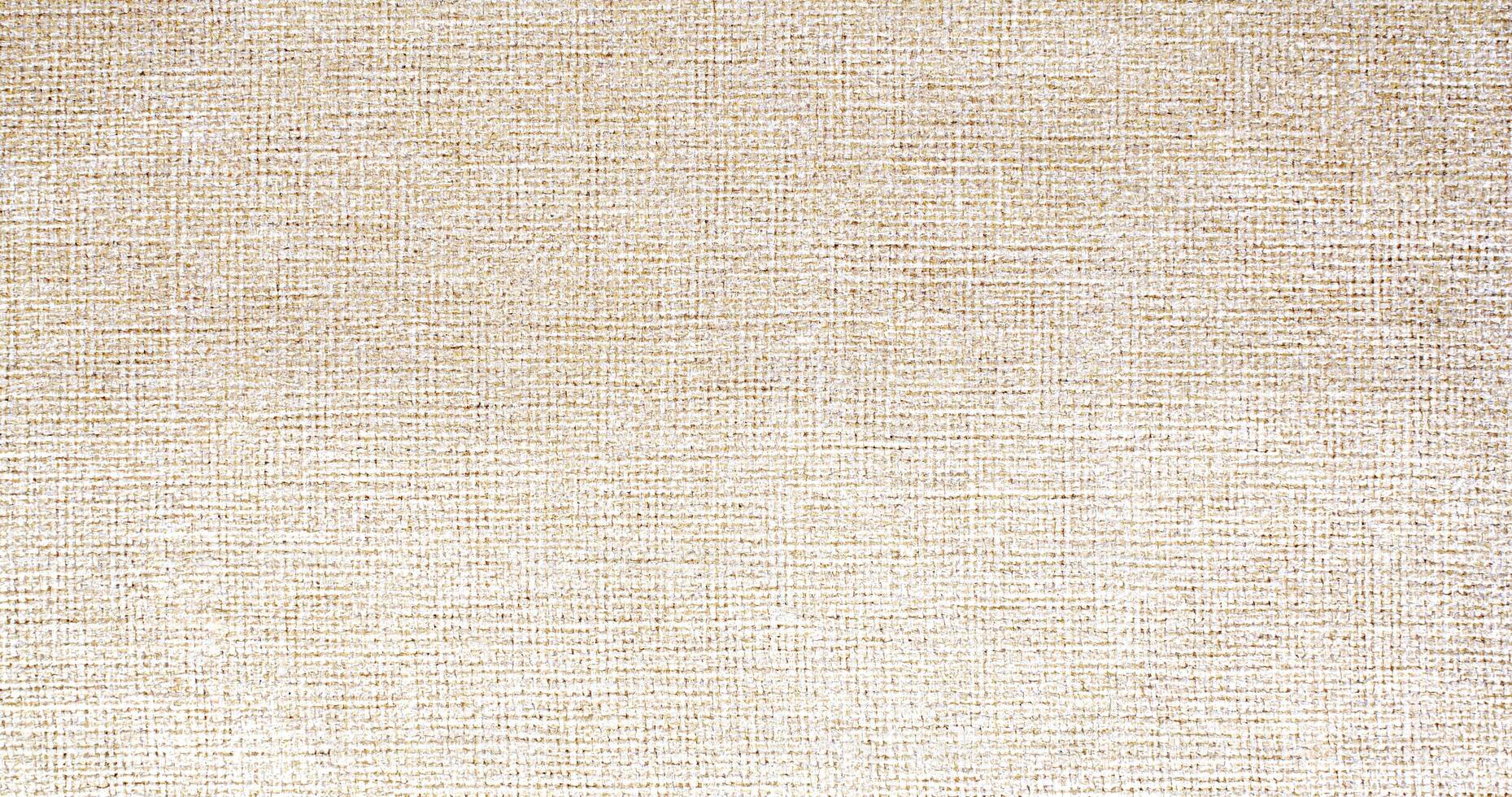 Natural linen material textile canvas Fabric texture background Close-up detail of fabric natural color Hemp material pattern design wallpaper. can be used as background or for graphic design photo