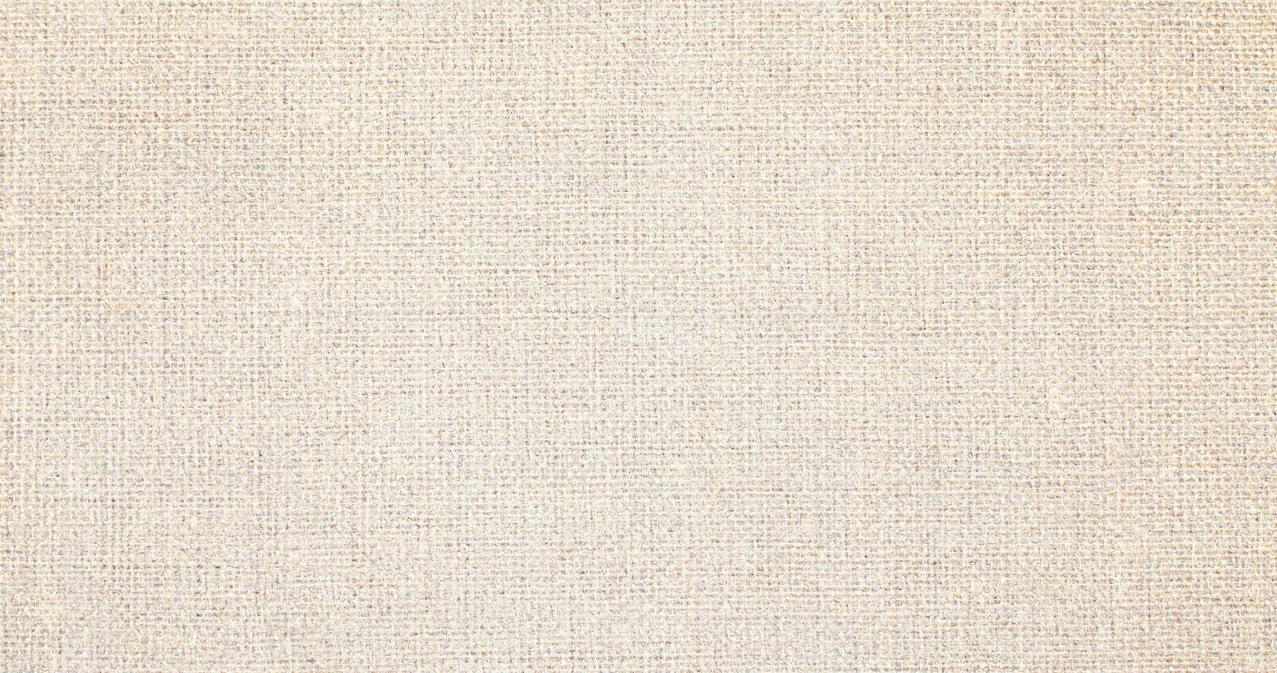 Natural linen material textile canvas Fabric texture background Close-up detail of fabric natural color Hemp material pattern design wallpaper. can be used as background or for graphic design photo