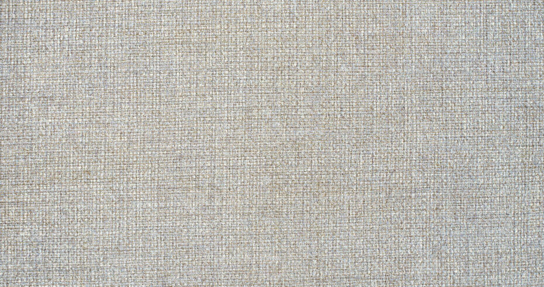 Natural linen material textile canvas Fabric texture background Close-up detail of fabric natural color Hemp material pattern design wallpaper. can be used as background or for graphic design photo