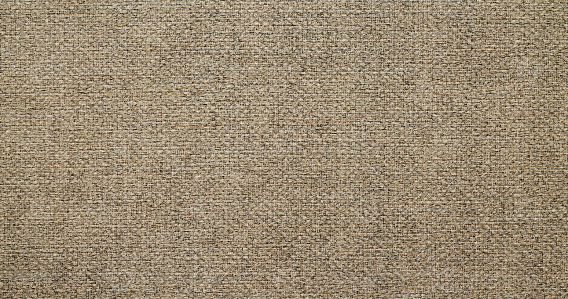 Natural linen material textile canvas Fabric texture background Close-up detail of fabric natural color Hemp material pattern design wallpaper. can be used as background or for graphic design photo