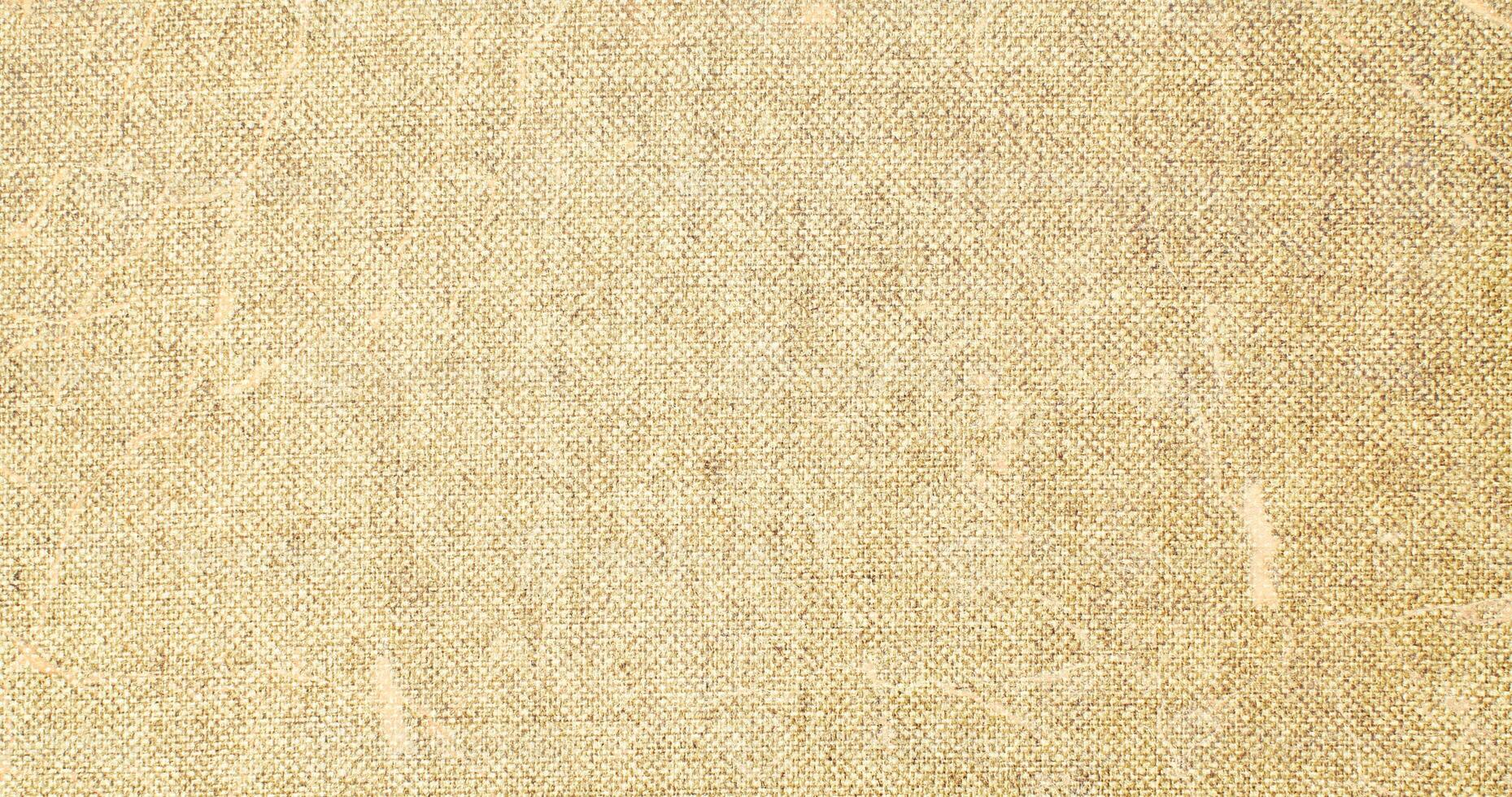 Natural linen material textile canvas Fabric texture background Close-up detail of fabric natural color Hemp material pattern design wallpaper. can be used as background or for graphic design photo