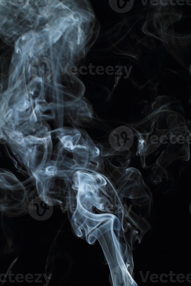 Abstract white smoke texture moves on black background Plume of smoke wave design wallpaper. Design element. Abstract texture photo