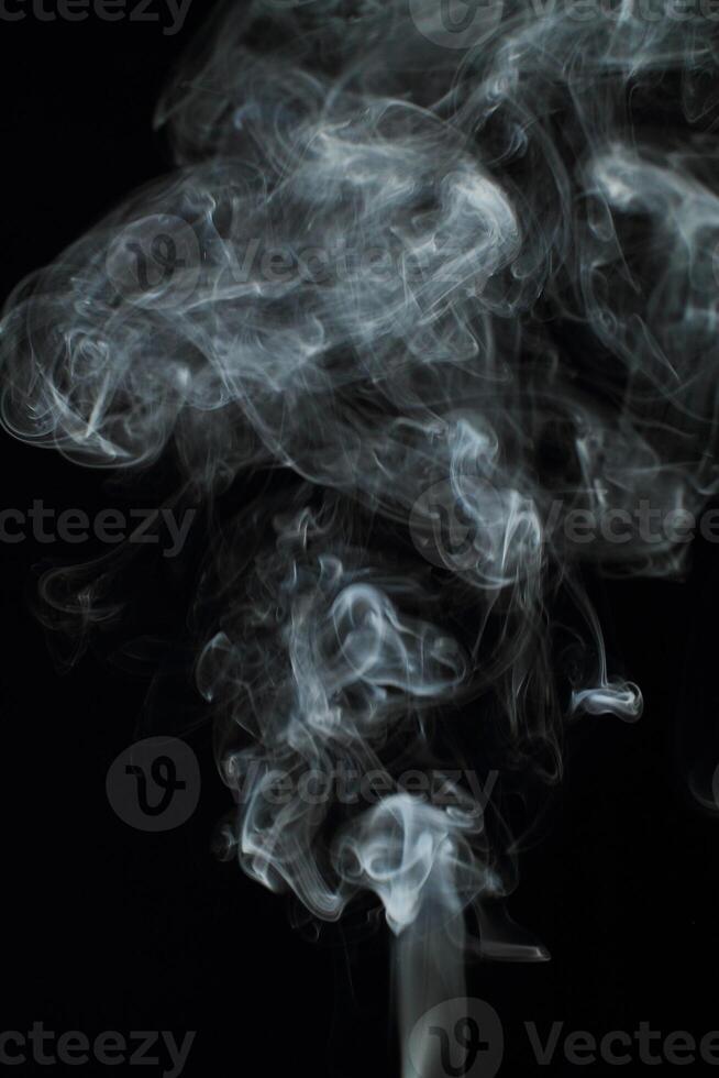 Abstract white smoke texture moves on black background Plume of smoke wave design wallpaper. Design element. Abstract texture photo