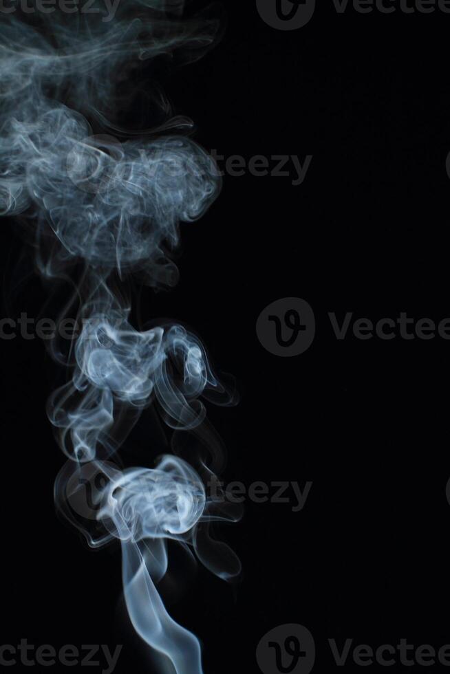Abstract white smoke texture moves on black background Plume of smoke wave design wallpaper. Design element. Abstract texture photo