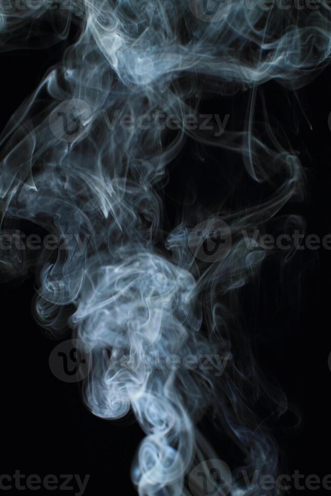 Abstract white smoke texture moves on black background Plume of smoke wave design wallpaper. Design element. Abstract texture photo
