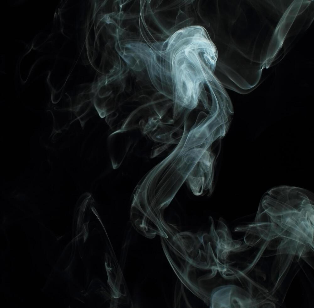 Abstract white smoke texture moves on black background Plume of smoke wave design wallpaper. Design element. Abstract texture photo