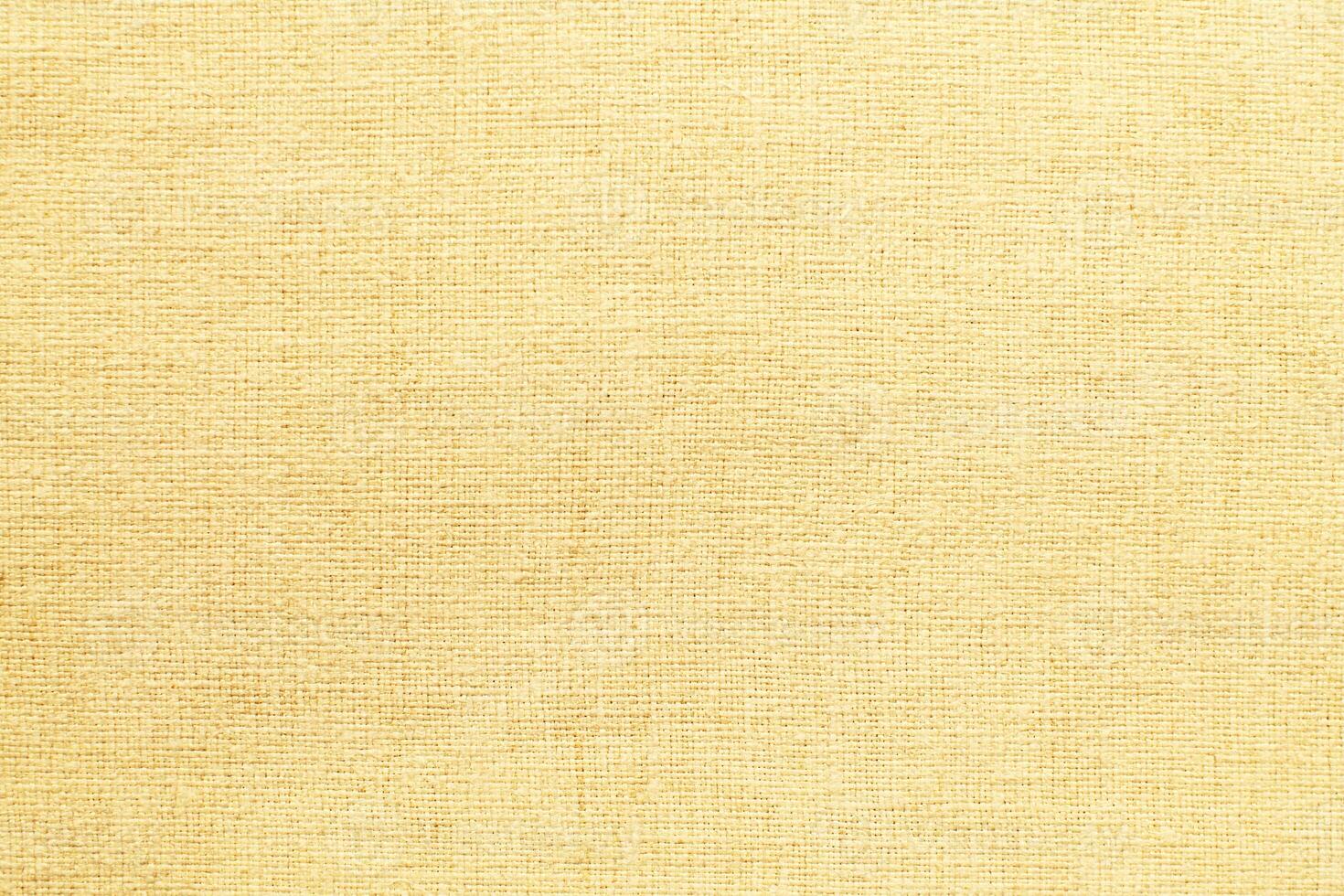 Natural linen material textile canvas Fabric texture background Close-up detail of fabric natural color Hemp material pattern design wallpaper. can be used as background or for graphic design photo