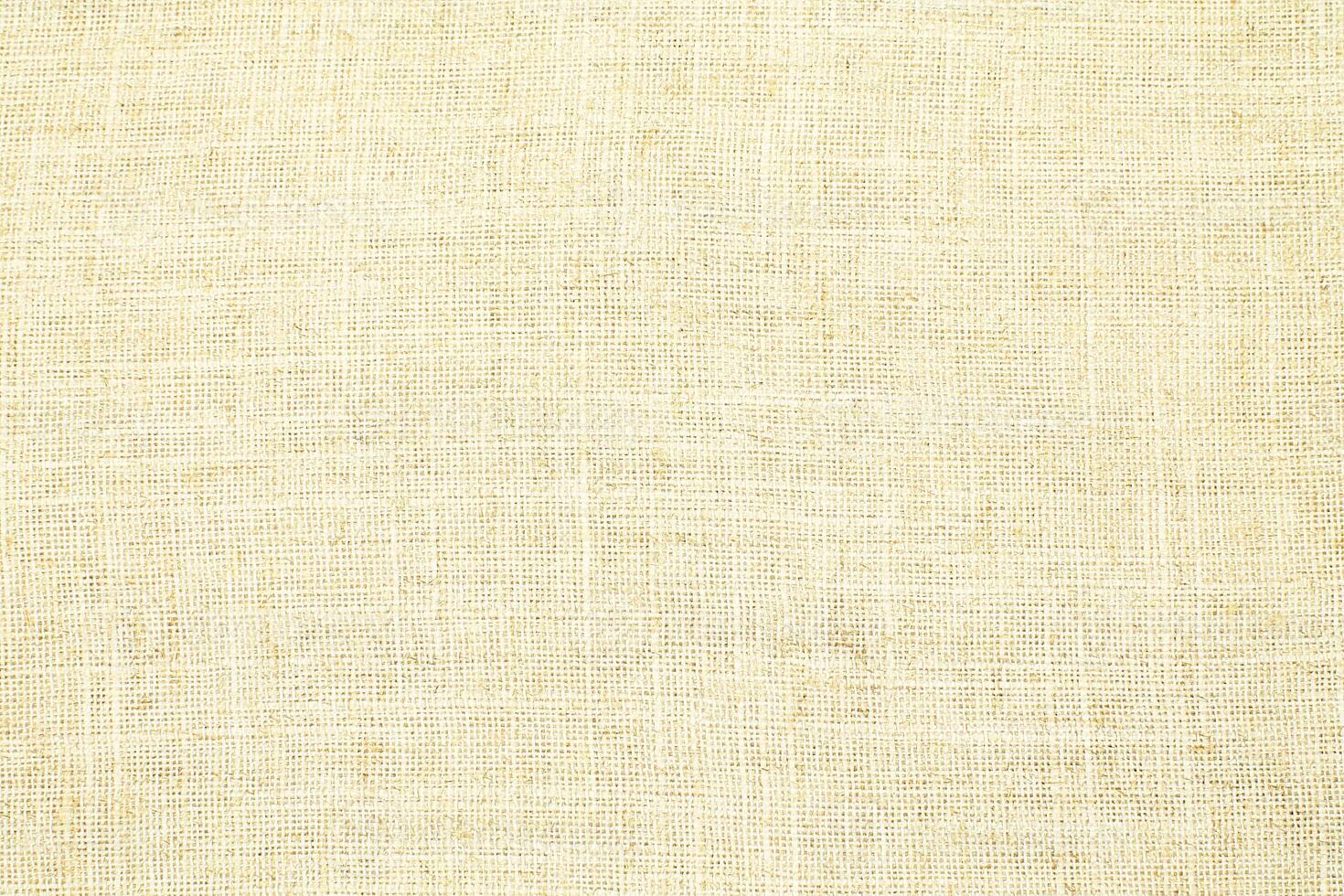 Natural linen material textile canvas Fabric texture background Close-up detail of fabric natural color Hemp material pattern design wallpaper. can be used as background or for graphic design photo