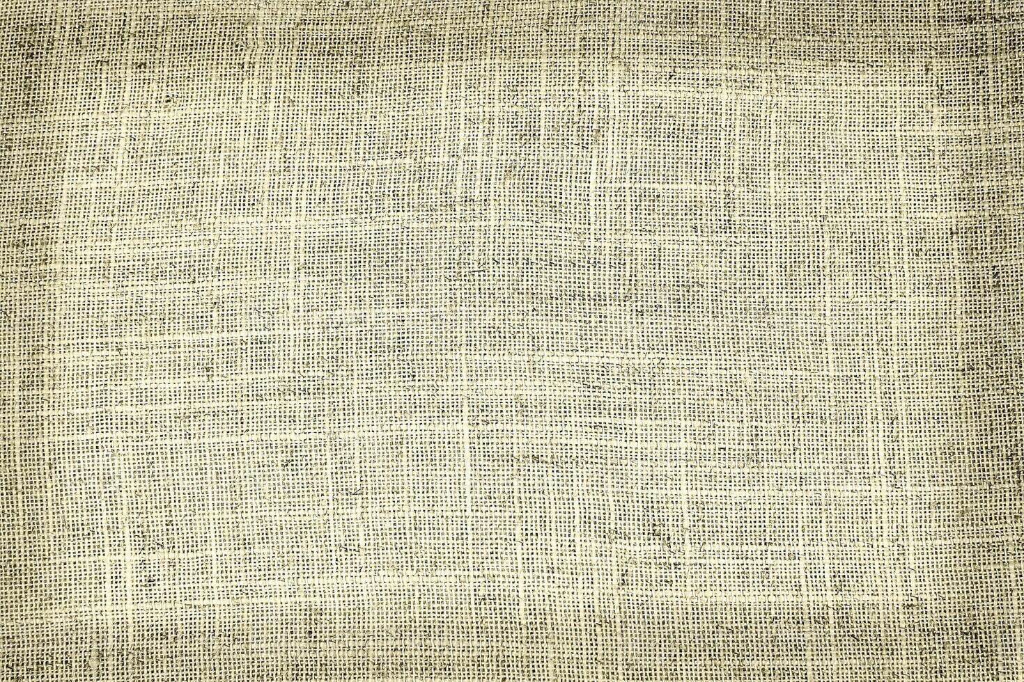 Natural linen material textile canvas Fabric texture background Close-up detail of fabric natural color Hemp material pattern design wallpaper. can be used as background or for graphic design photo