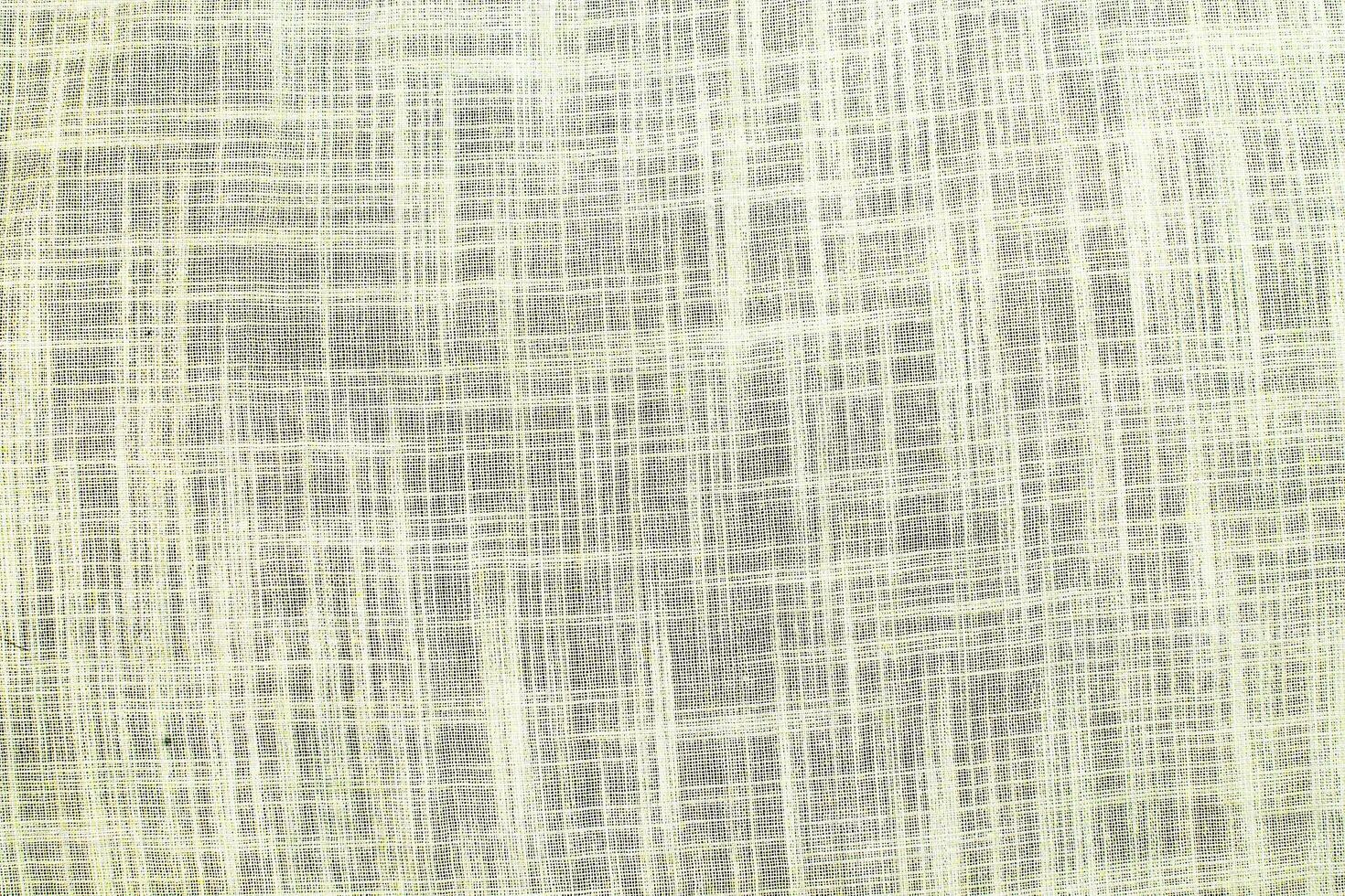 Natural linen material textile canvas Fabric texture background Close-up detail of fabric natural color Hemp material pattern design wallpaper. can be used as background or for graphic design photo