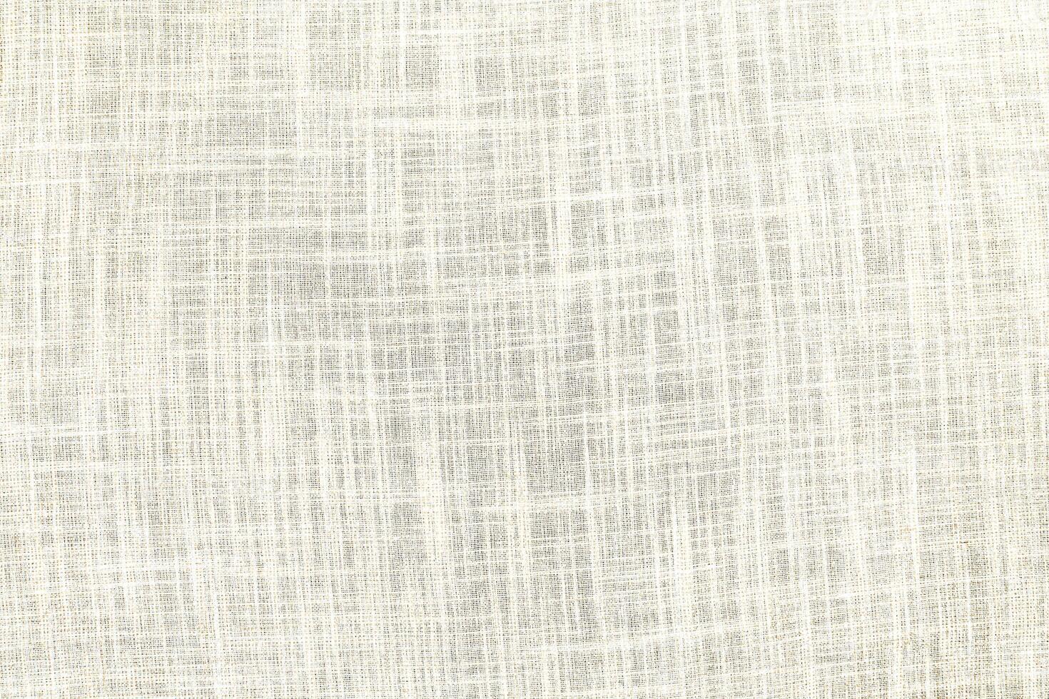 Natural linen material textile canvas Fabric texture background Close-up detail of fabric natural color Hemp material pattern design wallpaper. can be used as background or for graphic design photo