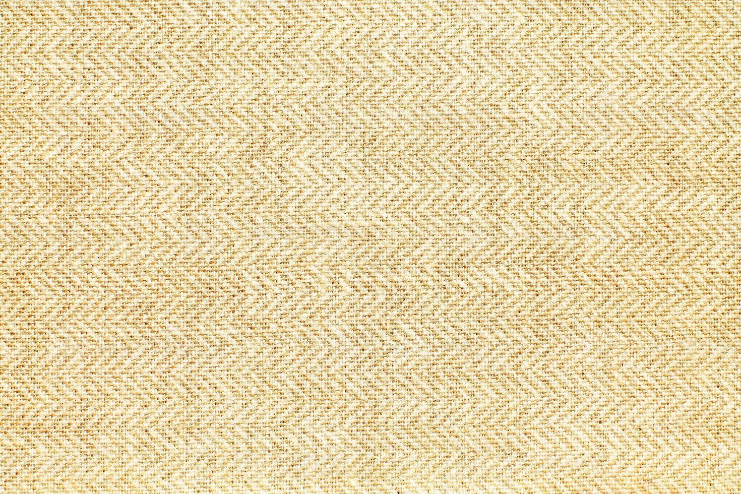 Natural linen material textile canvas Fabric texture background Close-up detail of fabric natural color Hemp material pattern design wallpaper. can be used as background or for graphic design photo