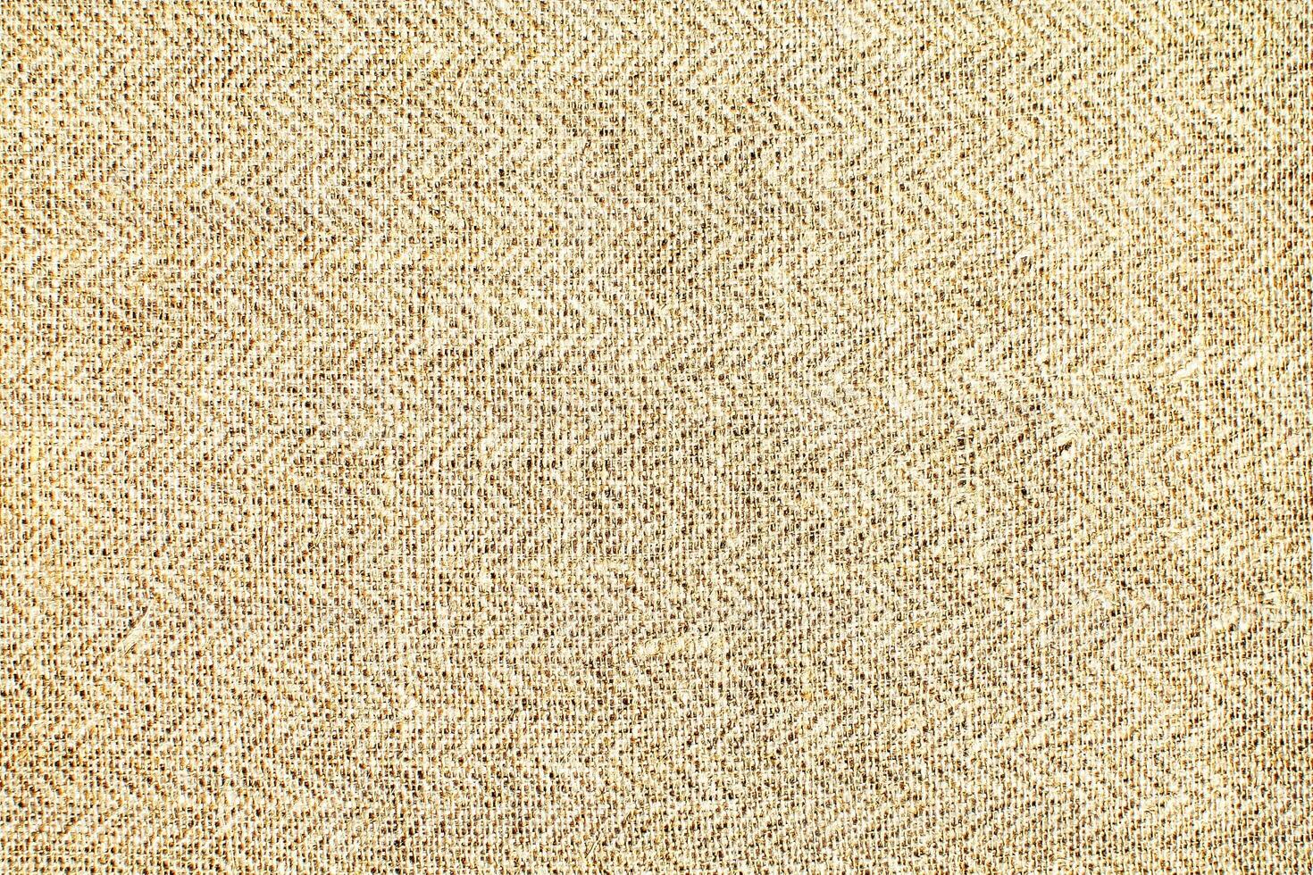 Natural linen material textile canvas Fabric texture background Close-up detail of fabric natural color Hemp material pattern design wallpaper. can be used as background or for graphic design photo
