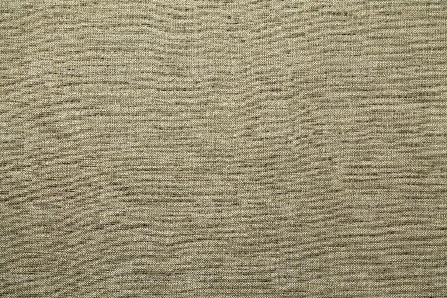 Natural linen material textile canvas Fabric texture background Close-up detail of fabric natural color Hemp material pattern design wallpaper. can be used as background or for graphic design photo