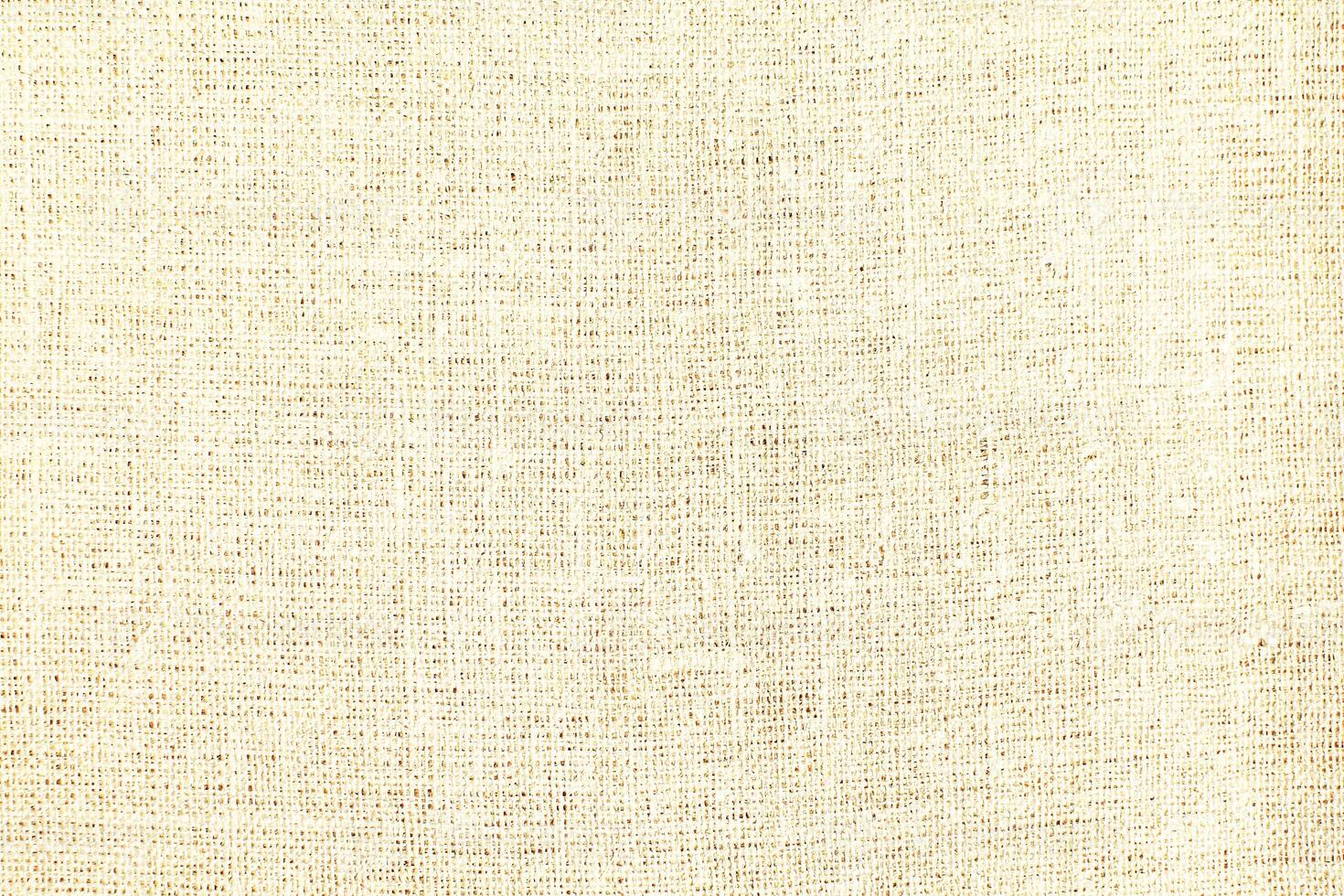 Natural linen material textile canvas Fabric texture background Close-up detail of fabric natural color Hemp material pattern design wallpaper. can be used as background or for graphic design photo